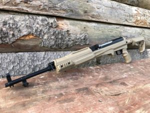 fab-defense-zfi-inc-m4-sks-tan-partially-folded-on-wooden-surface 3